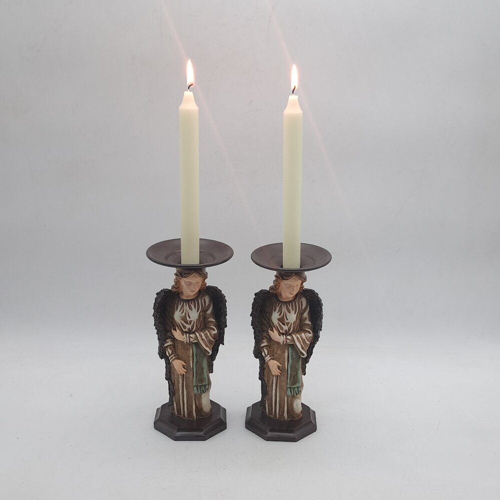 Two Angel Candle Holders With Candles